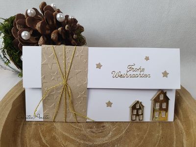 Gutschein- oder Geldgeschenkverpackung zu Weihnachten mit Häuser in Gold